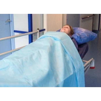 Couverture à usage unique bleu clair - 140 x 240 cm (carton de 25)